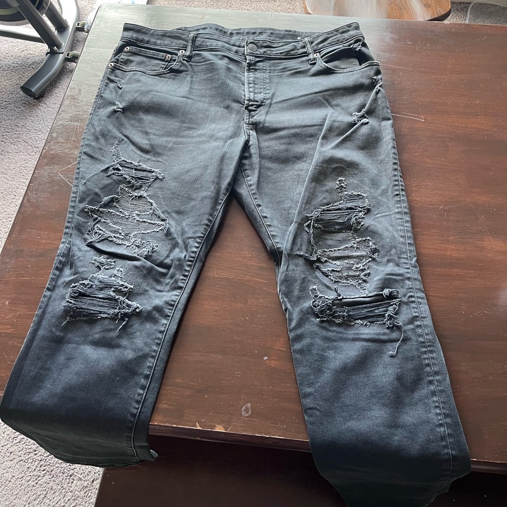 American Eagle washed black distressed jeans. Size 38 X 32. Worn once or twice.